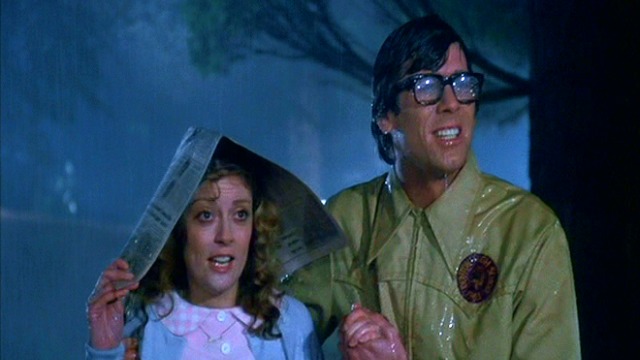 Brad and Janet in the rain
